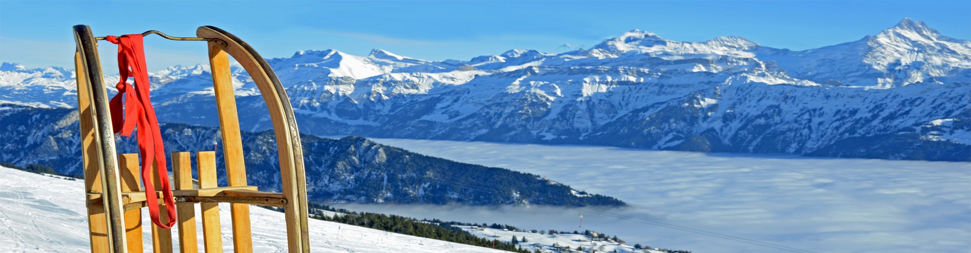 Schlittenfahren in den Alpen